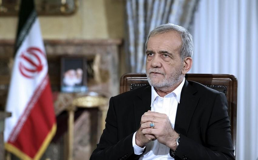İran prezidenti İraq parlamentinin sədrini qəbul edib