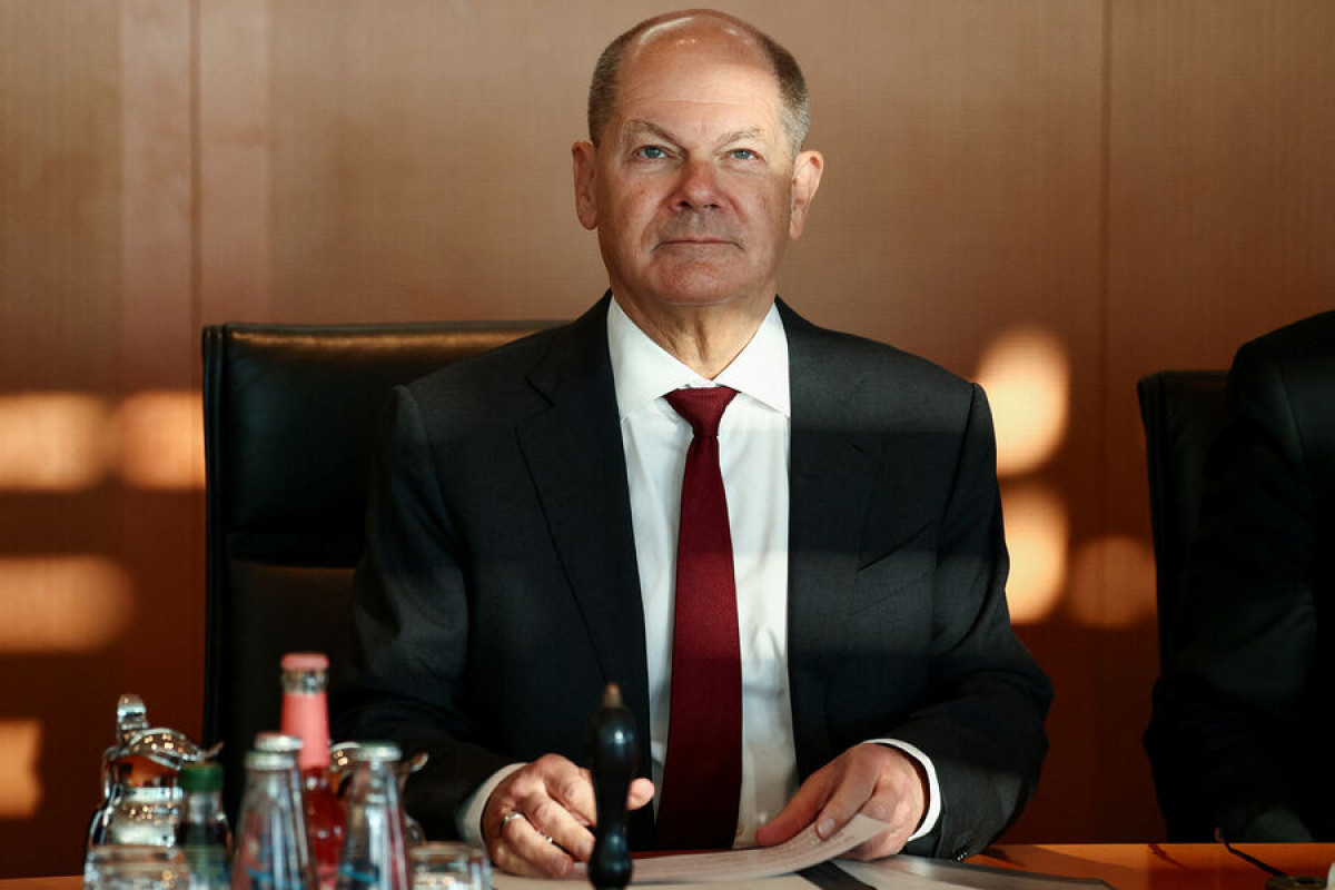 Olaf Şolts fövqəladə vəziyyət elan edilməsini tələb edib